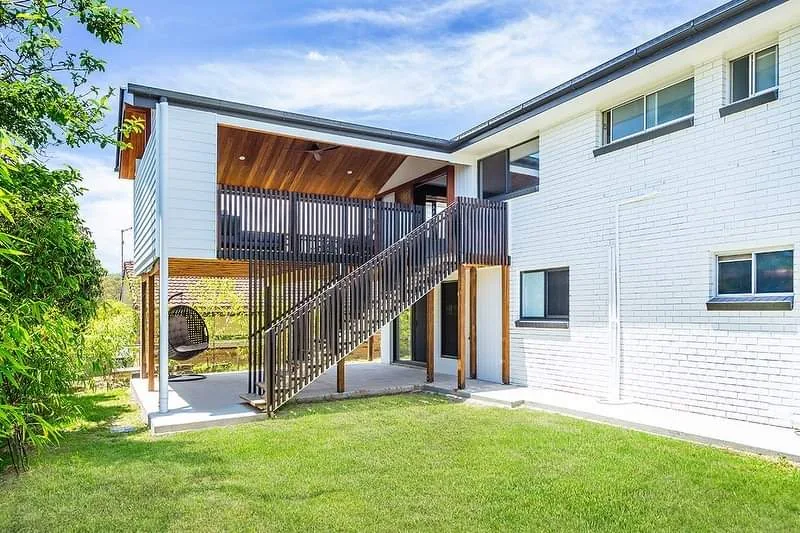 Two-storey renovation with new deck, stairs and cladding, a Seaforth Builders project on the Gold Coast